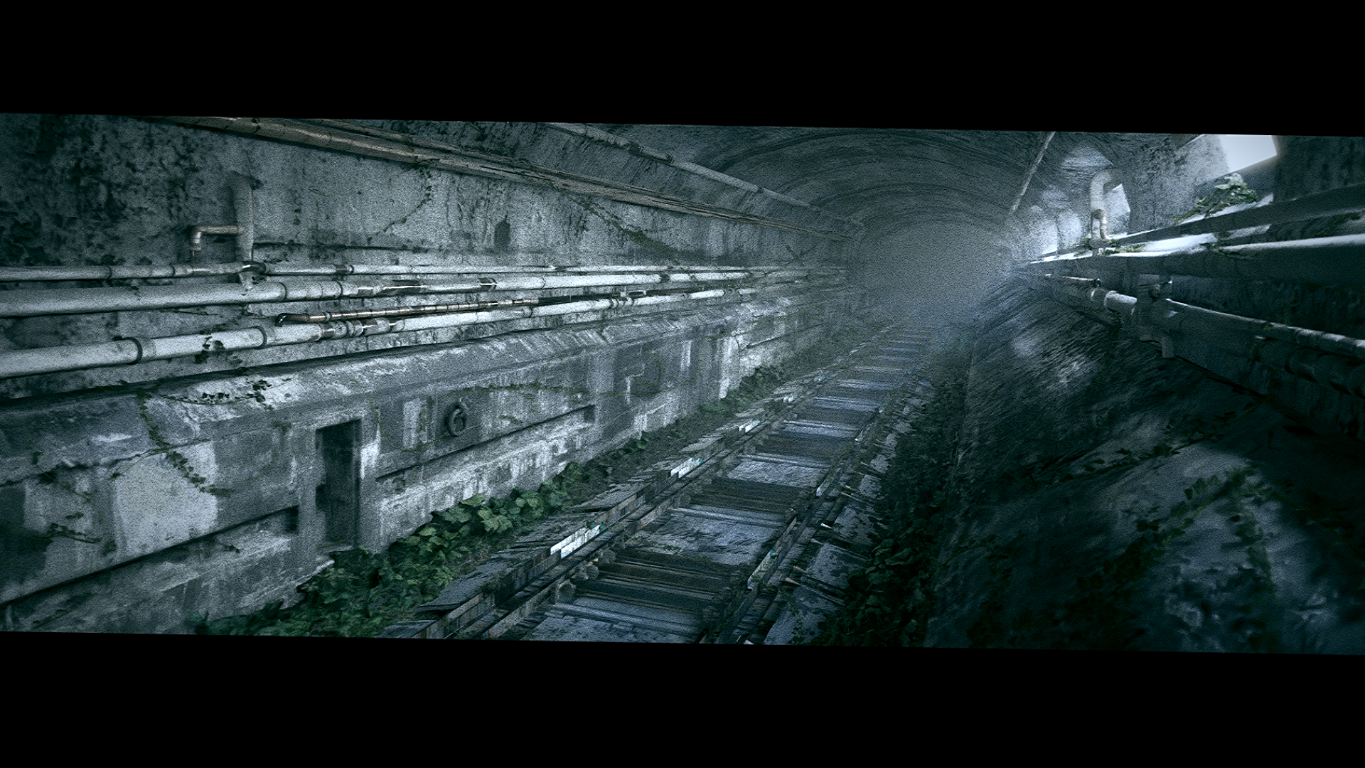 A dark tunnel with railway tracks
